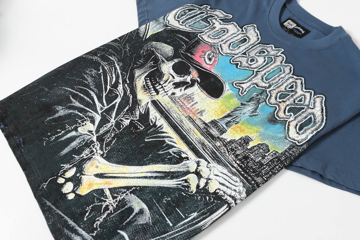 Godspeed Skeleton Driving NYC Double‑Sided Short Sleeve Tee (Slate Blue / Cream Yellow)
