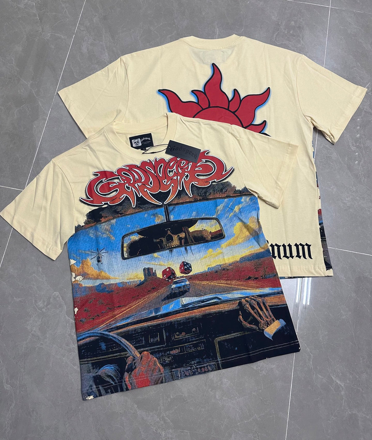 Godspeed Desert Road Trip Skeleton Driving Short Sleeve Tee (Cream Off‑White)