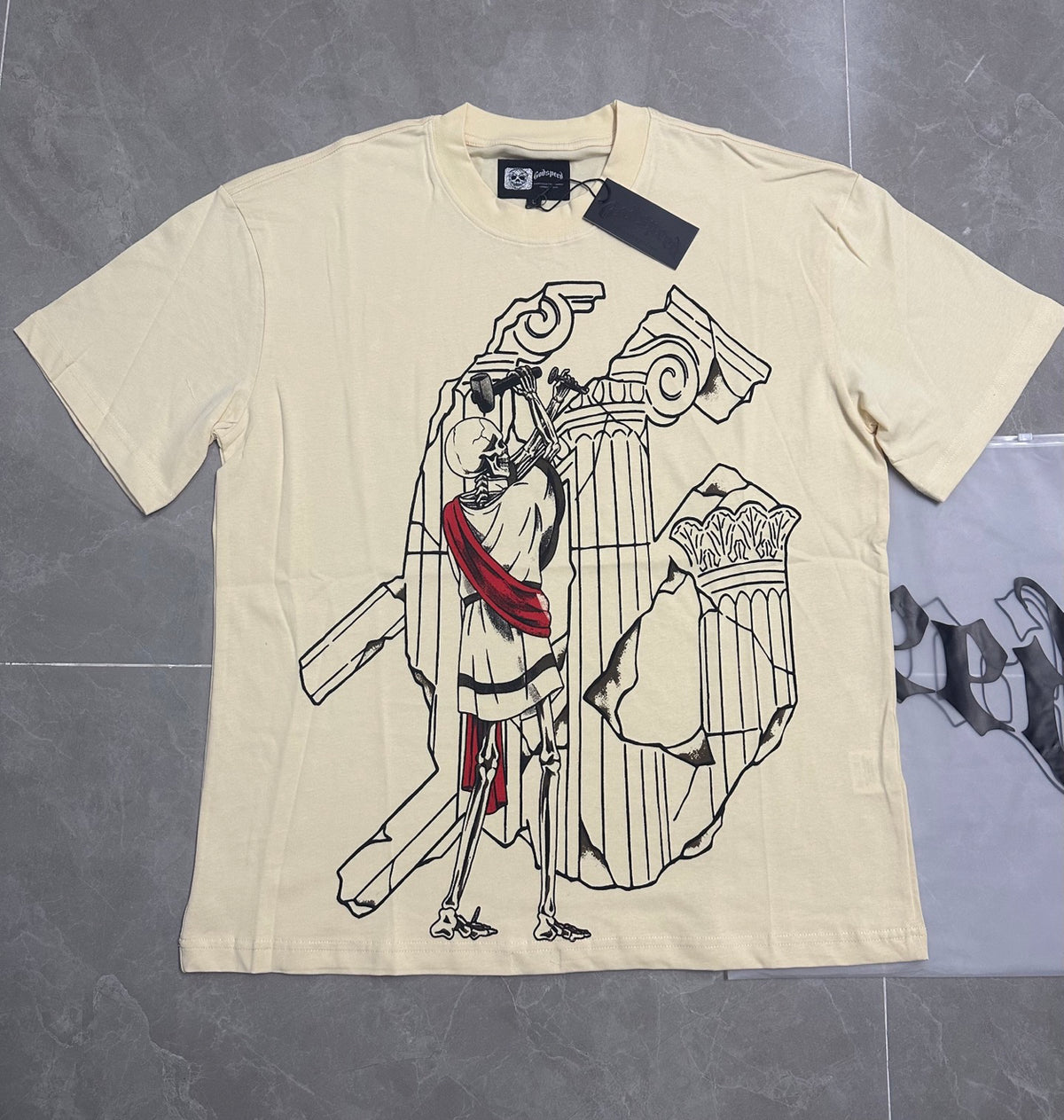 Godspeed Skeleton Roman Sculptor Vintage Short‑Sleeve Tee (Cream)