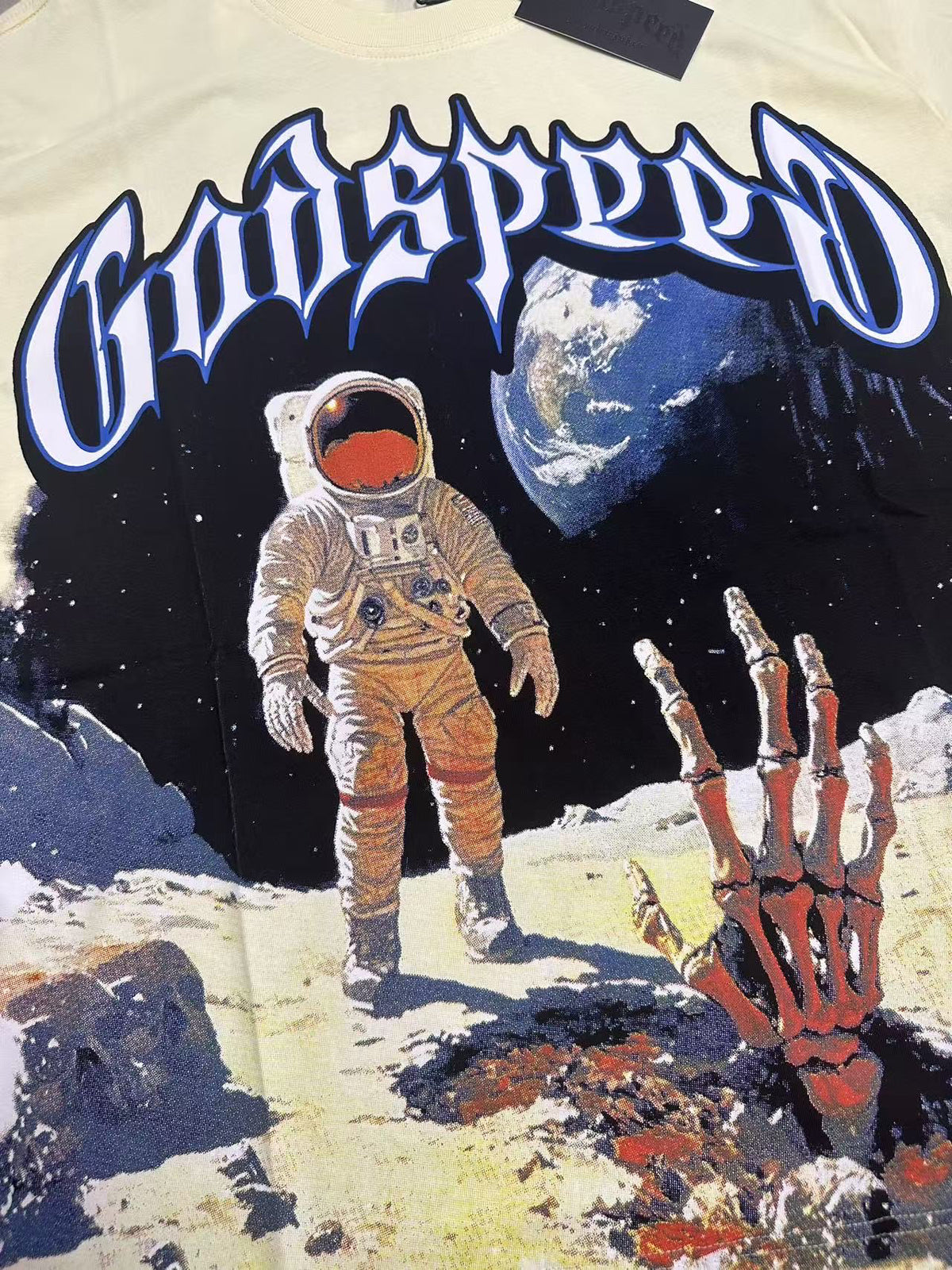 Godspeed Moon Astronaut Skeleton Hand Short Sleeve Tee (Cream Yellow)
